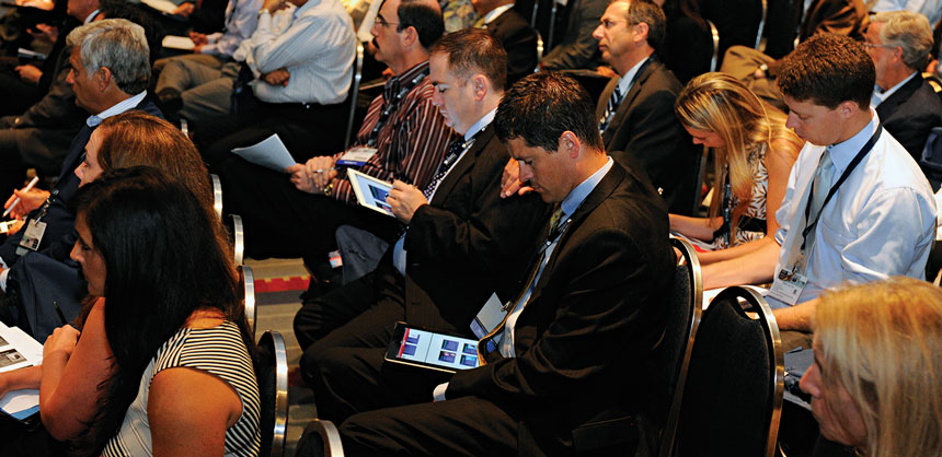 Attendees interact with their iPads during an American Academy of Otolaryngology – Head and Neck Surgery Foundation education program. Credit: AAO-HNSF and The Photo Group