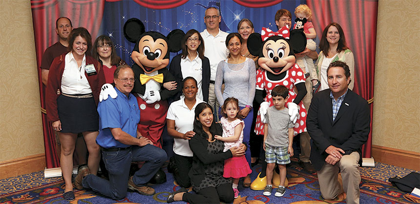 The California Transit Association's Public and Community Transportation Conference & Expo featured a Disneyland-inspired theme: "Imagineering Transit." Attendees and their families posed for photos with Mickey and Minnie. Credit: Tom Kawashima