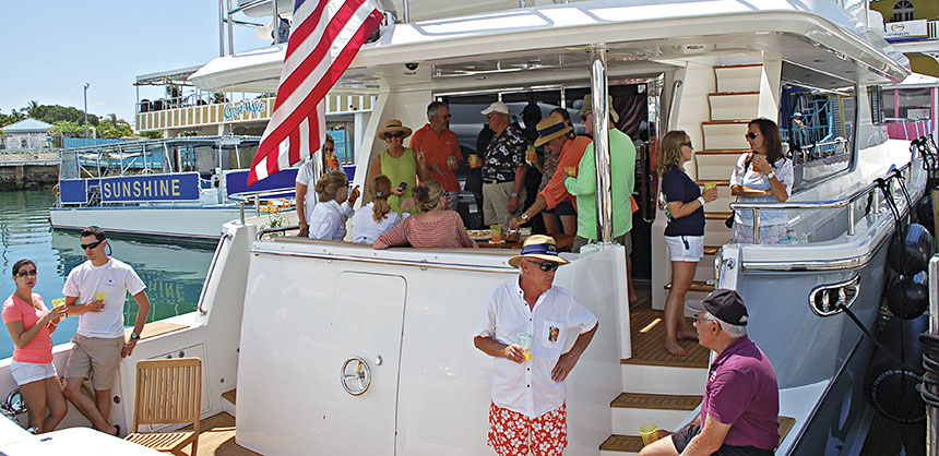 Guests of Horizon Yacht USA enjoy a sun-filled day onboard a Horizon yacht during an incentive program in the Bahamas. Credit: Horizon Yacht USA