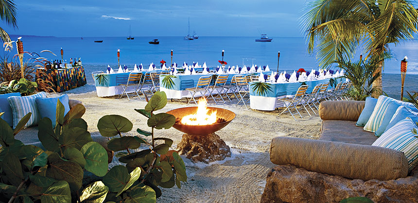 No tie (or shoes) required for beach events like this one at a Sandals resort. The Sandals Luxury Meetings & Incentives Collection offers nine all-inclusive luxury resorts in six Caribbean countries. Credit Sandals Resorts International