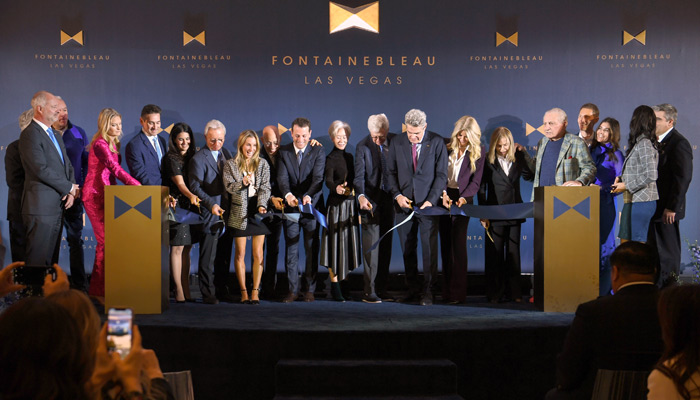 (L-R) Chief Executive Officer of the Las Vegas Convention and Visitors Authority Steve Hill, guest, Fontainebleau Las Vegas COO Colleen Birch, Fontainebleau Las Vegas President Mark Tricano, Fontainebleau Development Chief Administrative Officer Stacie Michaels, guest, guest, Fontainebleau Development's Chief Brand and Design Officer Peter Arnell, Fontainebleau Development President Brett Mufson, guest, CEO of Koch Industries Charles Koch, Fontainebleau Development Chairman & CEO Jeffrey Soffer, Colleen Schiff, Carol Soffer, Donald Soffer, Fontainebleau Las Vegas CMO Shane Smith, Fontainebleau Las Vegas Chief Casino Marketing Officer Michelle Reda and Fontainebleau Las Vegas CFO John Helderman attend the Fontainebleau Las Vegas Celebrates Official Grand Opening with Ribbon Cutting Ceremony at the Fontainebleau Las Vegas on December 13, 2023 in Las Vegas, Nevada. (Photo by Denise Truscello/Getty Images for Fontainebleau Las Vegas)